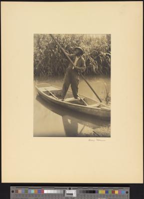 African-American man, standing in boat (recto)