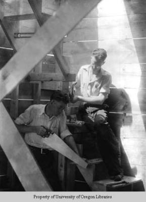 Students building a house, Berea College: building stairs