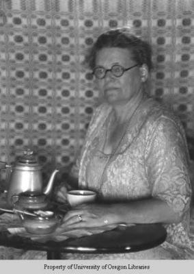 Anna Ernberg, with tea set, woven background