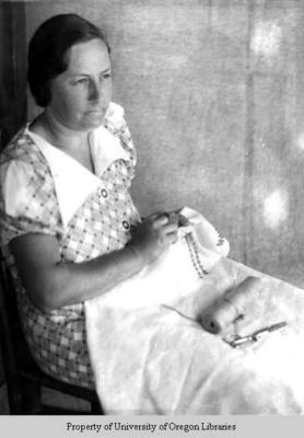 Ethel May Stiles, doing needlework