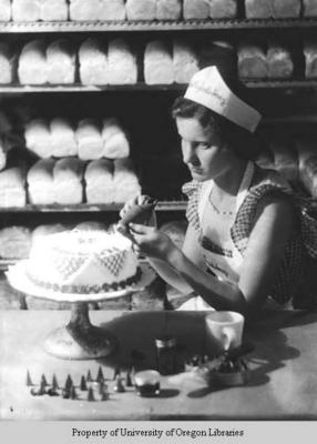 Bakery, Berea College: decorating a cake