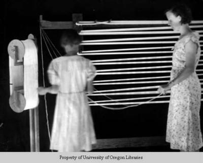 Georgia and Laura Trentham, weavers, warping