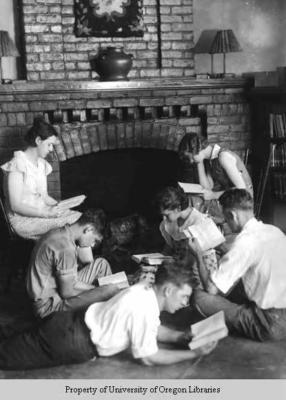 Students, Berea College, reading around the fireplace