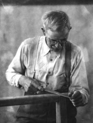 Samuel Clark, loom maker, at work