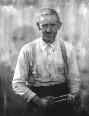 Samuel Clark, loom maker, with tools