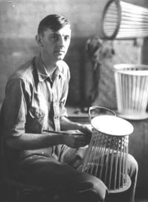 Victor McConkey, carpenter, making basket