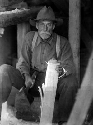 Peter Ingram, furniture maker, working wood