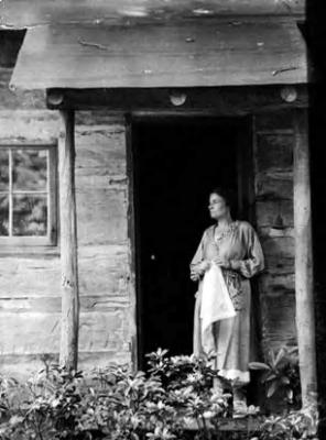 Clementine Douglass, spinner, in cabin door