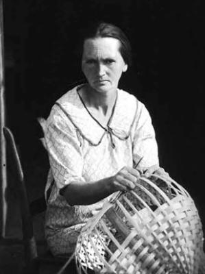 Woman, weaving a basket