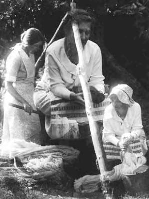 Mrs. Viner (triple exposure), weaver and dyer, at work
