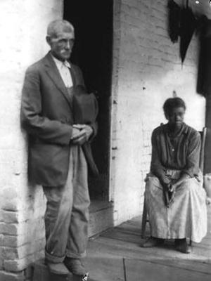 African-American woman and man on porch