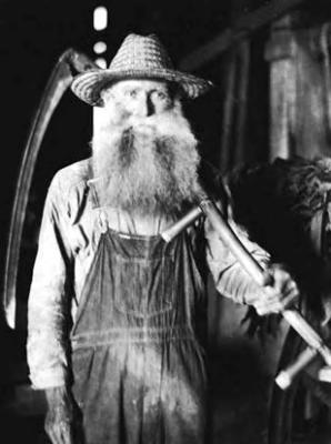 Man with beard, with scythe